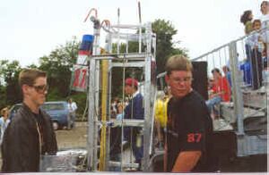 Team 87 with their robot [2]