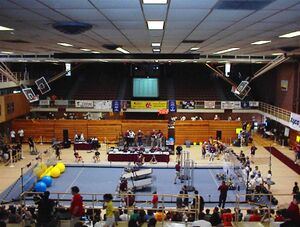 The field before the start of a match. Dual timers were projected during matches [1]