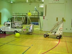 The 1997 number 118 robot at a 2000 scrimmage. Over the next few years teams frc84, frc143, frc222, and frc284 all traced themselves back to this 1997 robot [1]