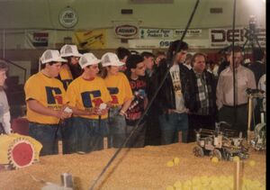 The chicken robot sitting in the corner during a match at the 1992 FIRST Robotics Competition [3]