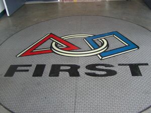 The large FIRST logo at the entrance in 2002 [1]