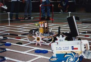 Robots playing Block 'N Load [10]
