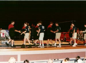 Teams 16 and 67 shake hands. [3]