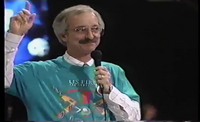 Woodie Flowers starting a match in the staff shirt [10]