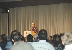 Woodie Flowers speaking at the 1996 kickoff event [2]