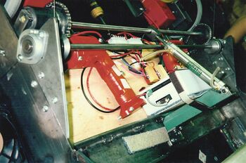 The receiver and relay box, Tekin speed controllers, and drill motors on team 171's 1996 robot [13]